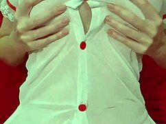 Don't you love watching this pretty blonde tease her huge silicone tits through a see-through dress up close?