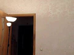 A beautiful woman dances seductively and plays intimately for webcam viewers