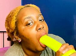 blonde babe grabs dildo and sucks it like a real cock