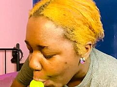blonde babe grabs dildo and sucks it like a real cock