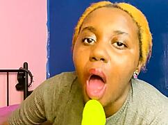 blonde babe grabs dildo and sucks it like a real cock