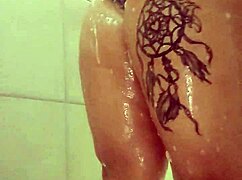 Curvy BBW babe soaps up big tits and ass in steamy shower tease