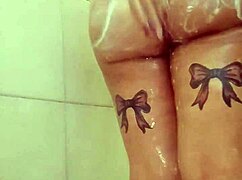 Curvy BBW babe soaps up big tits and ass in steamy shower tease