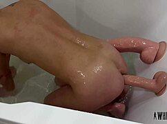 master pushes his anal slave's limits with giant dildos in her tight holes then she squirts hard
