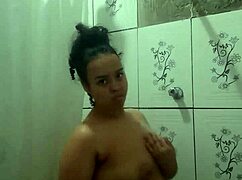 brunette latina teen fingers pussy in shower