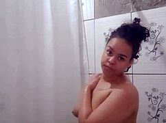 brunette latina teen fingers pussy in shower