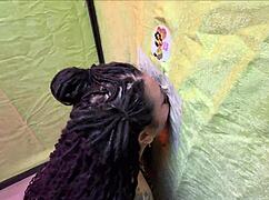 Brunette milf sucks small cock through gloryhole wall