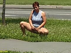 voyeur catches hungarian redhead bbw milf with huge melons peeing outdoors in public