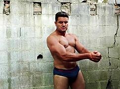 Yuri gaúcho flexes muscles, strokes huge cock, and unloads cum outdoors