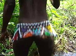 Skinny ebony tribe girl yields to deep forest stream pounding?