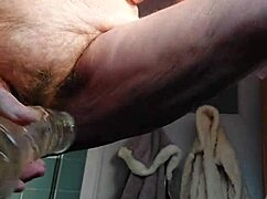 german granny oma rams huge dildo deep into hairy wet beaver pussy