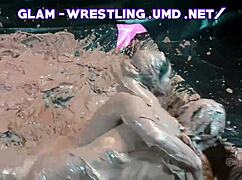 glamorous women wrestle in mud their tits slick and heaving