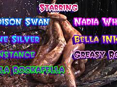 glamorous women wrestle in mud their tits slick and heaving