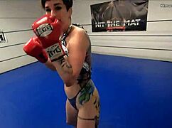 Watch out! Pro fighter smothers you topless in fierce tit attack!