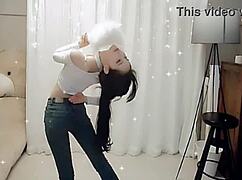 sexy chinese girl dances seductively on cam showing off curves