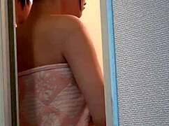 AKARI MINASE STRIPS NAKED IN SHOWER WASHING HER BIG TITS FOR WEBCAM!