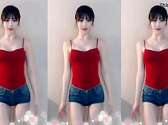cute chinese girl bounces up and down dancing sexy
