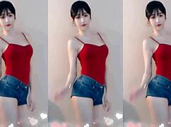 cute chinese girl bounces up and down dancing sexy