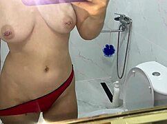 Skinny teen swaps dirty pads and wipes juicy pussy on toilet paper in bathroom piss fest