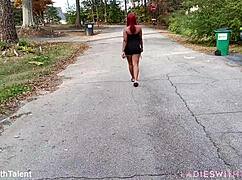 pretty girl in sexy dress outdoors teasing