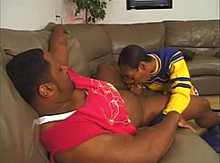ebony cheerleader in miniskirt rides big black cock doggystyle to facial cumshot