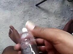 Labeto pumps cumshot into condom on sex machine