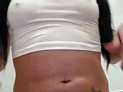 Emy Angel's wet t-shirt gets soaked!