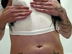 Emy Angel's wet t-shirt gets soaked!