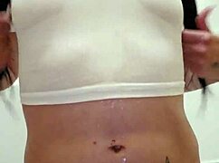 Emy Angel's wet t-shirt gets soaked!