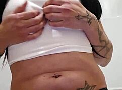 Emy Angel's wet t-shirt gets soaked!