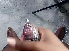 Labeto pumps cumshot into condom on sex machine