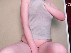 A pretty teen fingers her tight wet pussy solo at home building to a shaking orgasm in homemade video