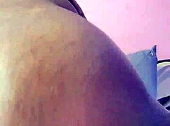 Ebony babe spreads creamy pretty pussy solo