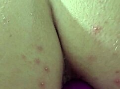 Woman uses anal toy for deep insertion and creamy results
