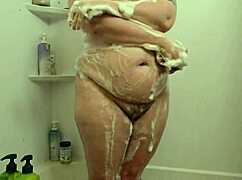 Hidden cam catches candid bbw milf soaking wet shower.