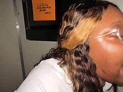 Ebony BBW gulps stranger BBCs deep at gloryhole