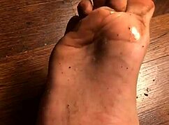 Licking Her Filthy Feet in Intense Fetish Worship