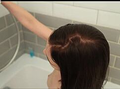 Woman enjoys warm shower time