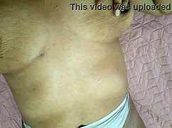 so the horny stepmom starts rubbing her juicy clit real slow cuz it itches from all that excitement