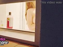 watch your chubby british neighbour flash her big natural tits in the shower now!