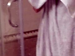 Who's Peeking at Milf's Shaved Pussy in Shower?