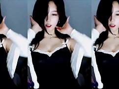 cute chinese girl dances so sexy but what's hiding under that teasing skirt?