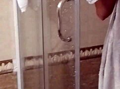 Who's Peeking at Milf's Shaved Pussy in Shower?