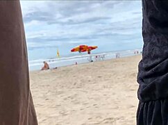 a hot milf strokes stranger's monster cock on public beach till cumshot close-up