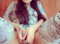 this cute amateur teen rubs her shaved pussy thru panties