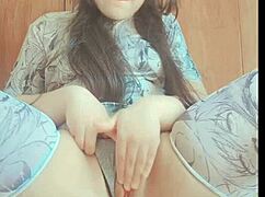 this cute amateur teen rubs her shaved pussy thru panties