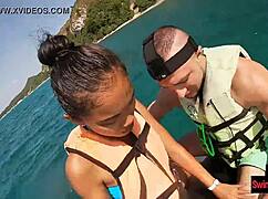 asian girlfriend drops to her knees for a public jetski blowjob