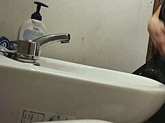 Balls Resting On Sink For Huge Cumshot