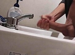 Balls Resting On Sink For Huge Cumshot