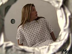 Brunette patient swallows cum in glory hole